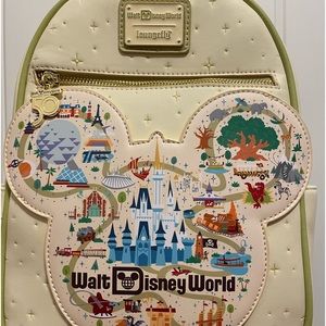 Disney World 50th anniversary lounge fly cream colored mini backpack like new